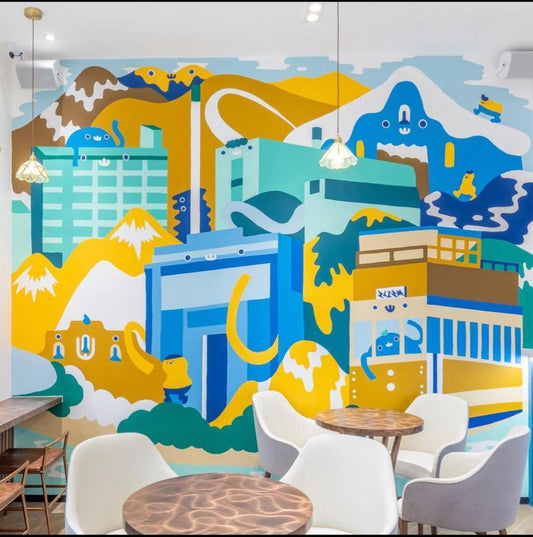 裕利工程餐廳工程案例牆上繪有彩色壁畫。